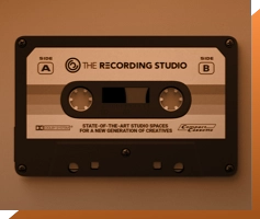 A black cassette tape with a label reading "The Recording Studio, London" on both sides. Side A and Side B are indicated. The bottom half of the label says "State-of-the-art studio spaces for a new generation of creatives.
